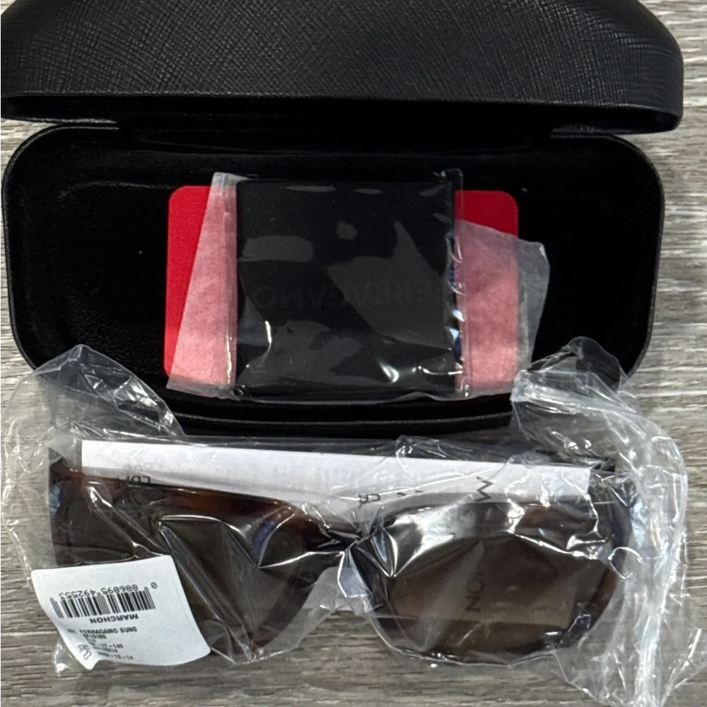 Salvatore Ferragamo Tortoise Sunglasses with SF Logo at Temples.